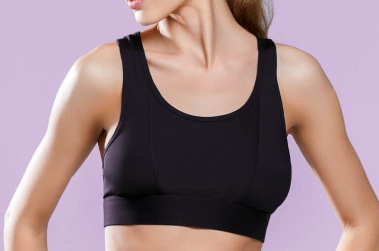 woman wearing black compression bra