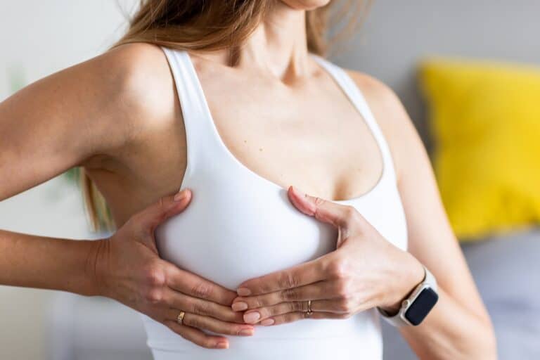 woman with smartwatch in white bra
